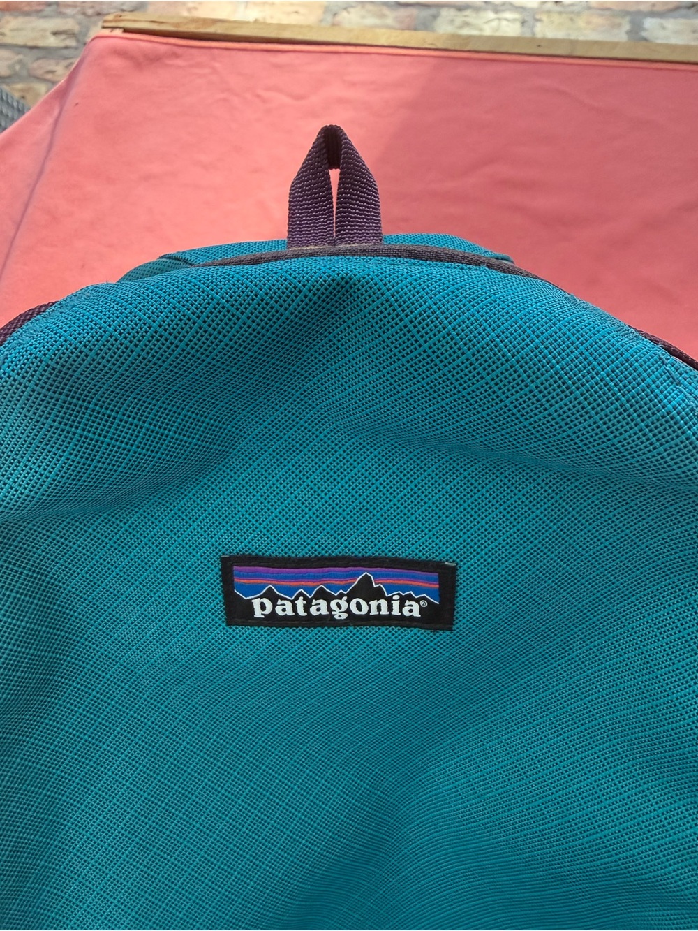 Patagonia Black Hole Cube 6L Teal with Purple, Orange, & Yellow Accents. - Picture 2 of 14